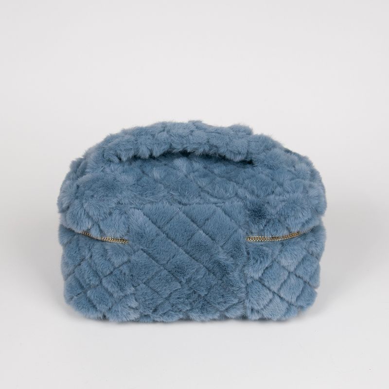 Stor makeup bag i fuskpels jeansblå