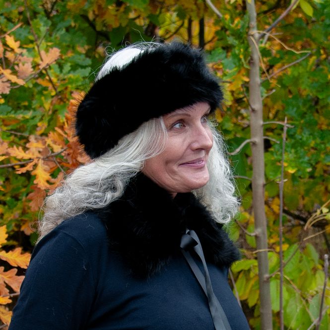 Huvudbild Pannband i fuskpäls svart