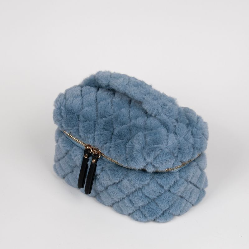 Stor makeup bag i fuskpels jeansblå